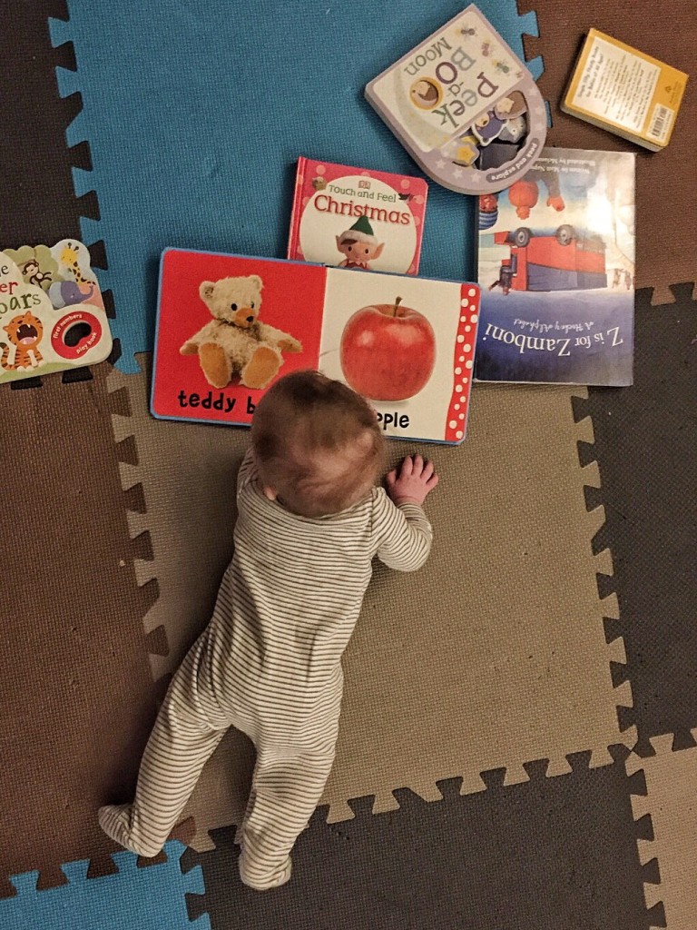 Only 6 months old and Adelaide already pours over books at a rapid pace.